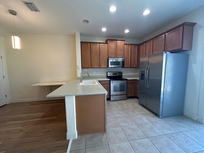 Building Photo - Charming Sawgrass Village Townhome with Pond Views & Modern Comfort