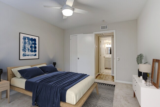 Large bedroom with brand new remote-control fan and walk-in closet. - 1880 White Oak Dr. Apt 119