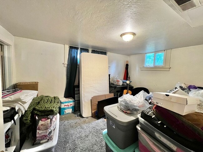Building Photo - Cozy 1-Bedroom Basement Apartment blocks f...