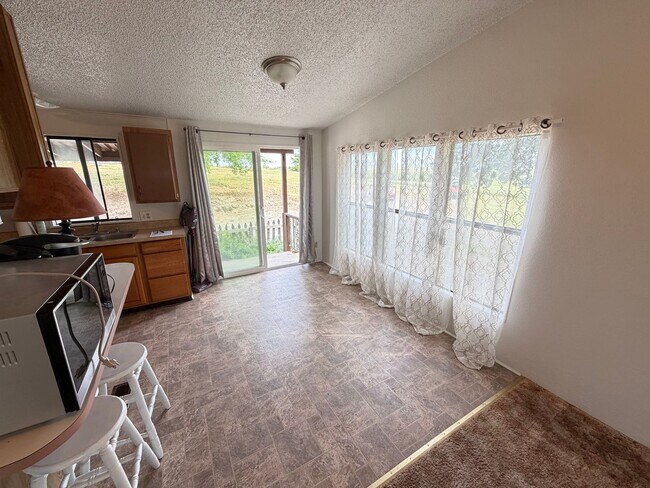 Building Photo - Secluded country home w/ 2-car garage