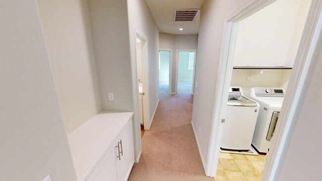 Building Photo - Bayfront Coastal Condo at The Strand | 3BR + 2-Car Garage, Resort-Style Amenities