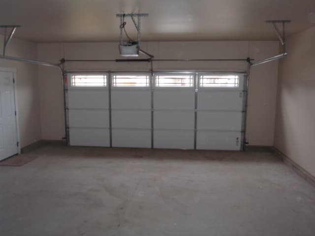 Building Photo - Newer house with attached garage. Half mon...