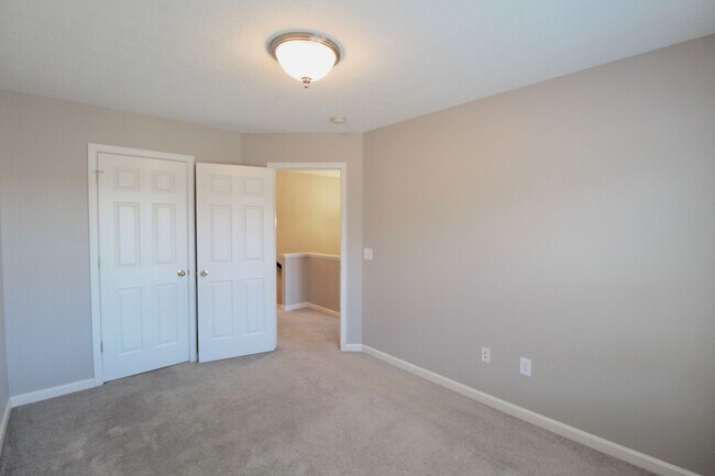 Building Photo - Upscale townhome  with attached garage for rent in the Townes at Bluestone!