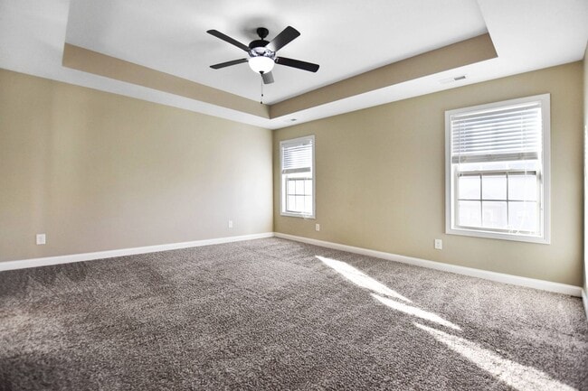 Building Photo - Pet Friendly Three Bedroom with Bonus!