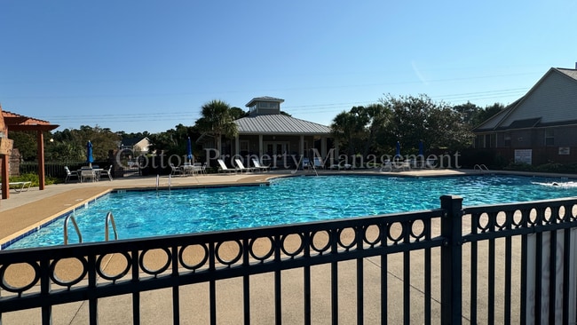 Building Photo - 4BR/3BA Well appointed home in the gated c...