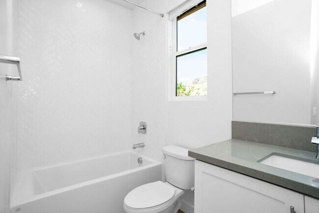 Building Photo - Gorgeous brand new townhome in 3Roots! End...