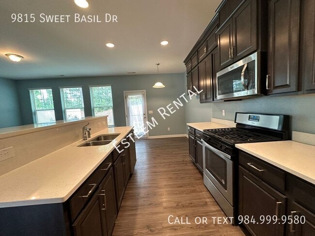 Building Photo - 9815 Sweet Basil Dr