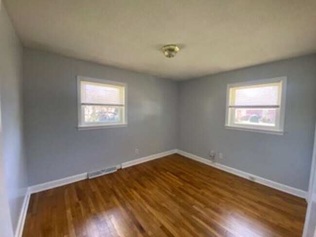 Building Photo - Great three bedroom home in country setting but located in town!