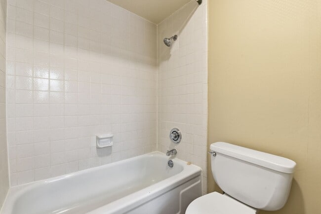 Building Photo - Come see this charming 2-story condo featuring 2 bedrooms and 2.5 bathrooms!