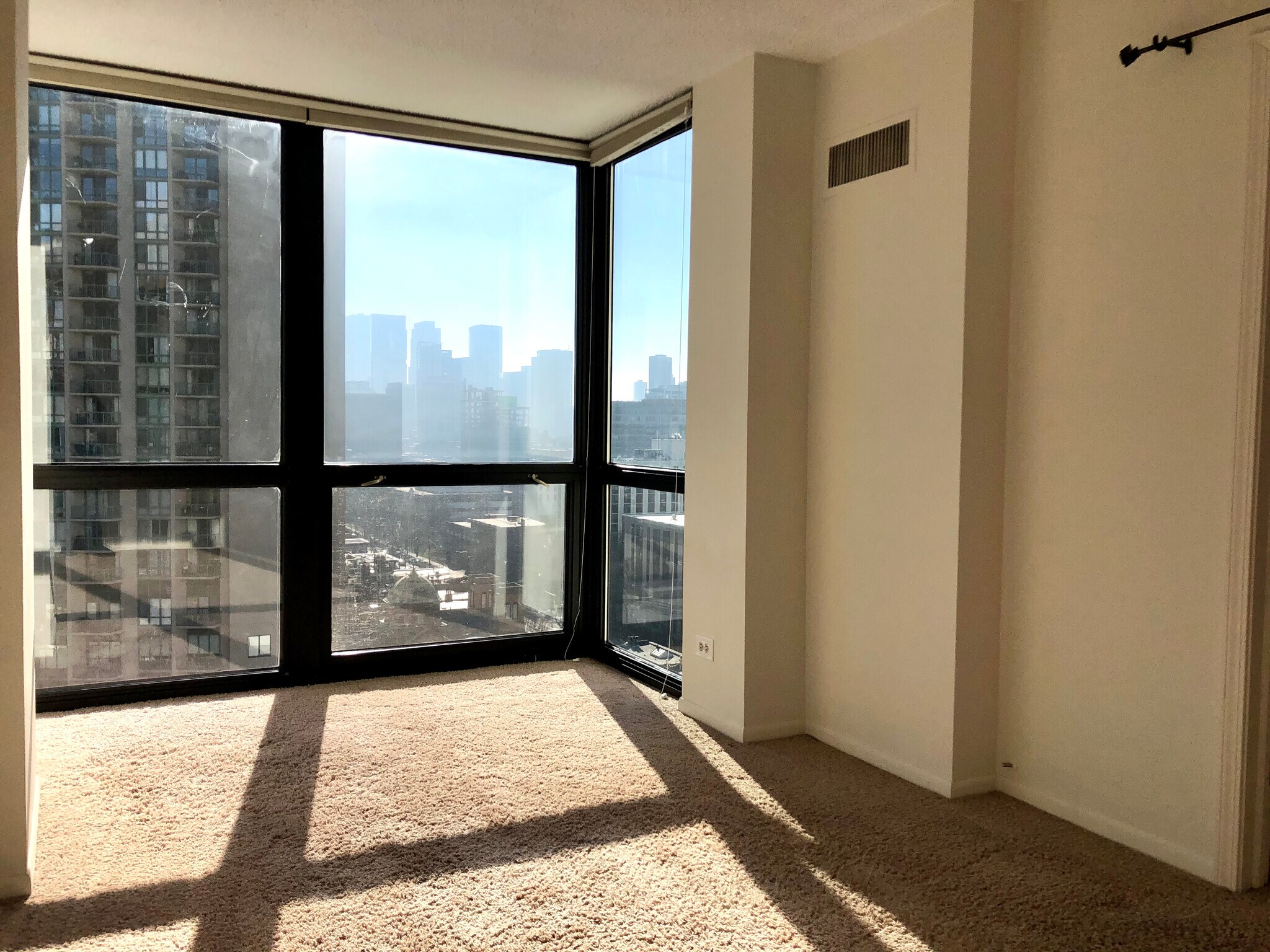 Bay window floor to ceiling windows in the bedroom. - 1122 N Clark St