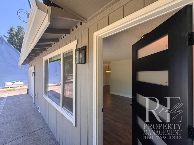 Building Photo - Renovated Poulsbo Home with A/C, & Covered Outdoor Living