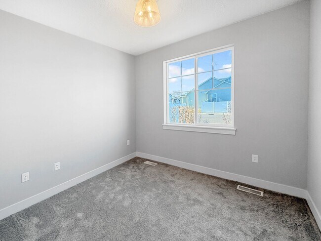 Building Photo - Brand-New 4-Bedroom Home in Nampa’s Pheasant Meadows | Near Gateway Center, Treasure Valley Marke...