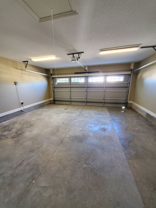 Building Photo - Spacious 4-Bedroom Home with Open Layout, Granite Finishes & Fenced Yard