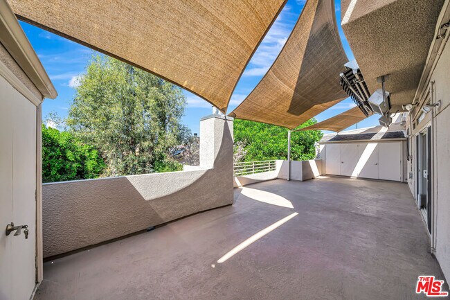 Building Photo - 4477 Woodman Ave