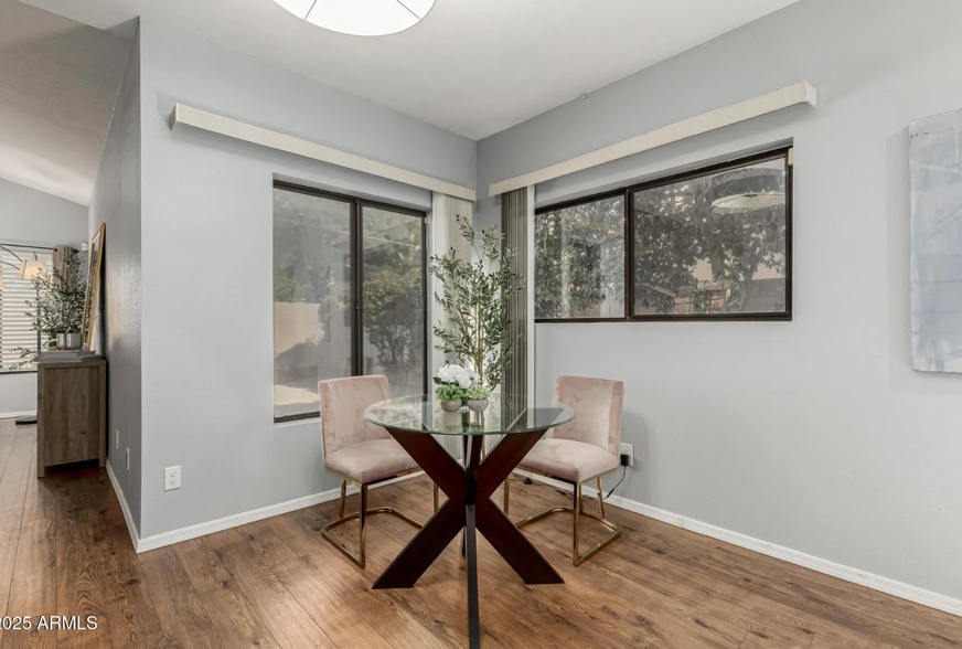 Staged, our 6 seat dining table fit great here, extended for company when needed! - 4747 N 84th Way