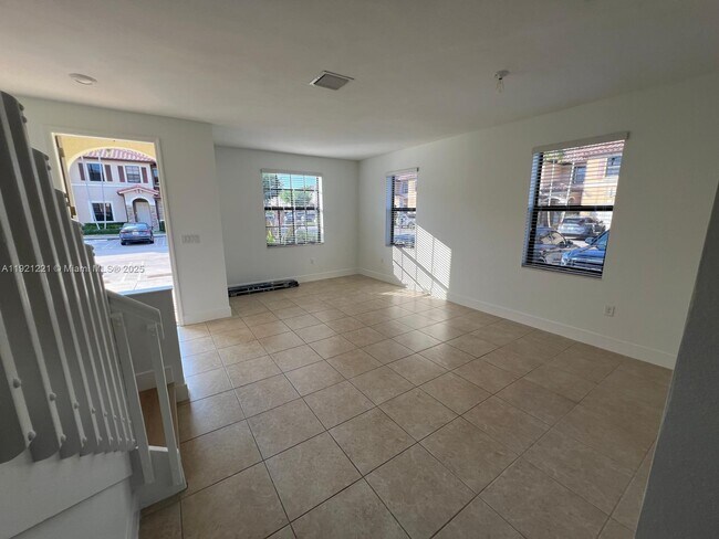 Building Photo - 9399 W 33rd Ln