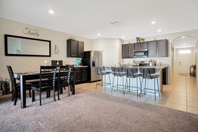 Building Photo - Discover this lovely 4-bedroom, 2-bath home in the sought-after Squires Grove community