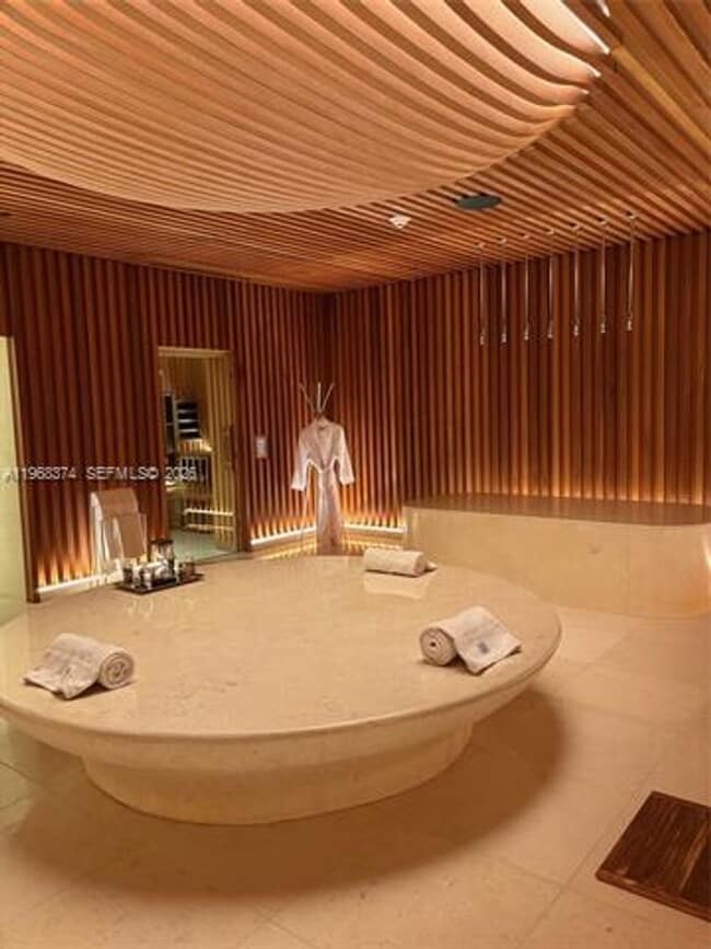 Building Photo - 8701 Collins Ave