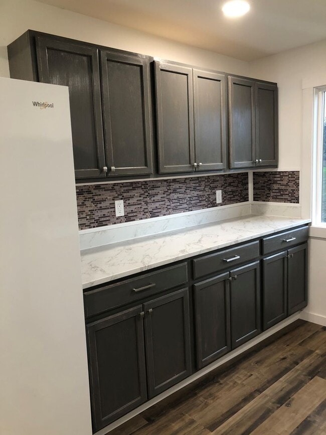 Building Photo - Updated 4 Bedroom House With Country Setting