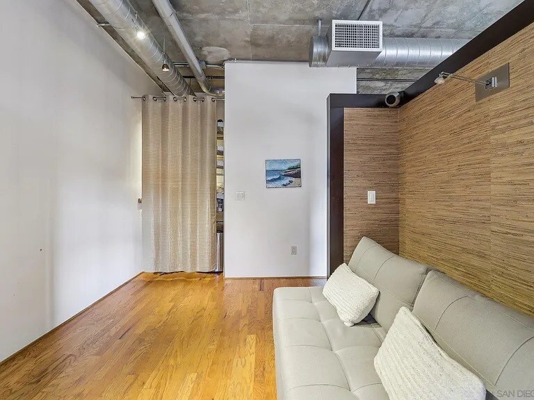 Sofa converts into a full bed. Room can be furnished with a Queen bed on request. - 877 Island Ave