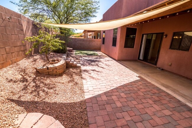 Building Photo - Gorgeous 3 Bedroom 2 Bathroom Home with Tile Throughout! Central A/C, 2 Car Garage!