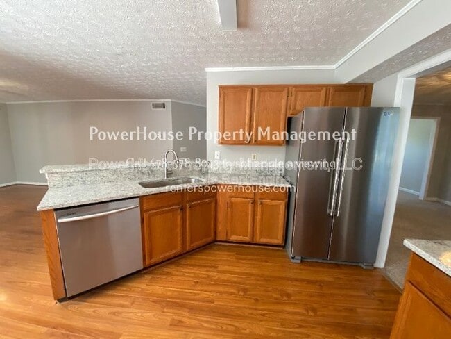 Building Photo - 605 Suwanee Lakes Cir NW