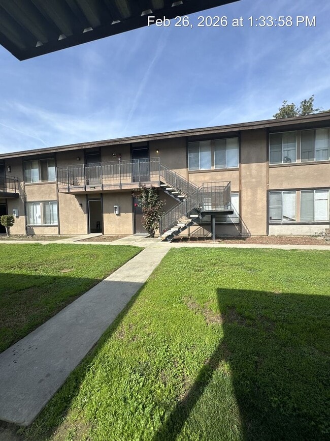 Building Photo - Upstairs unit available now!