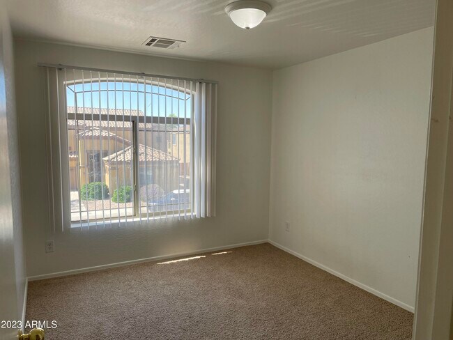 Building Photo - 23576 W Pecan Rd