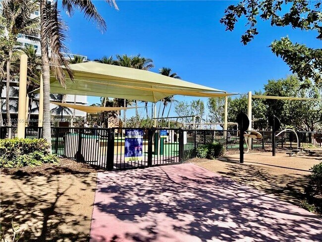 Building Photo - 6423 Collins Ave