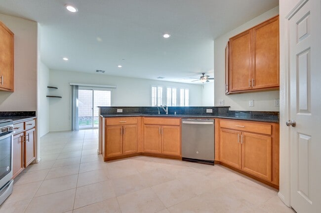 Building Photo - Green Valley!! Gated!! 4 Bedrooms!! Bed & Bath Downstairs!!  TANKLESS WATER HEATER!!! Covered pat...