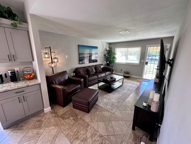 Building Photo - Fully Furnished - All Utilities Included -...