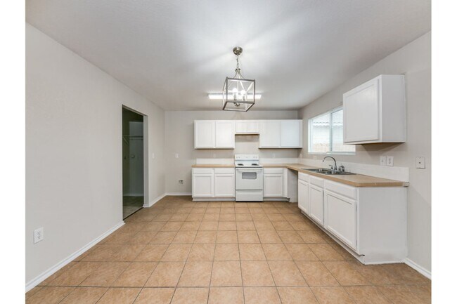 Building Photo - 6022 Plumbago Pl