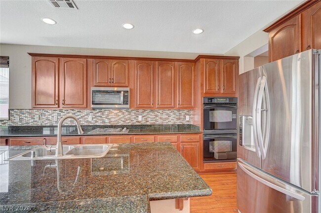 Building Photo - 7876 Sleeping Lily Dr
