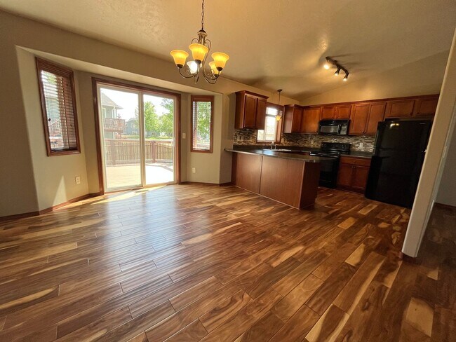 Building Photo - Stunning 4 Bed/2 Bath with 3 Car Garage and Fenced in Yard!
