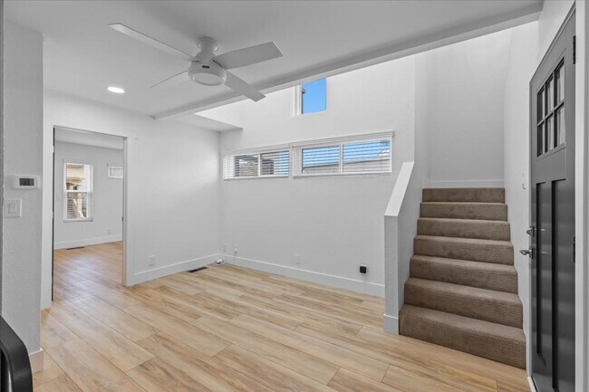 Building Photo - COMPLETELY REMODELED, BRIGHT & AIRY, TRI-LEVEL HOME W/ TOP-FLOOR GREAT ROOM LIVING SPACE, 2-CAR G...