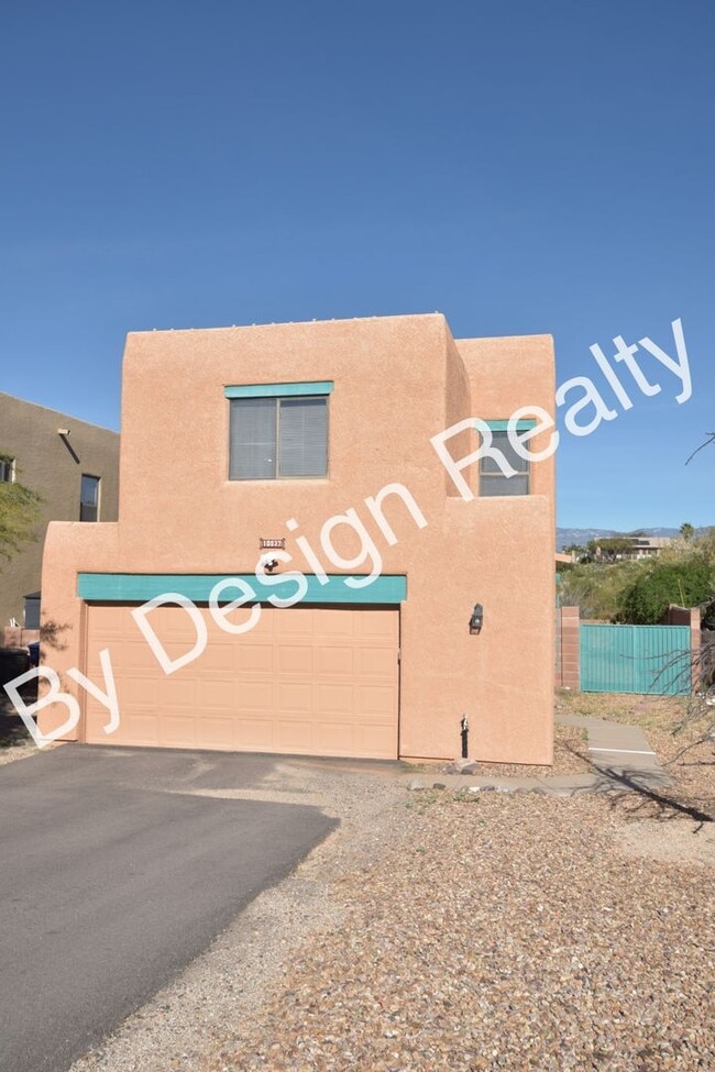Building Photo - Updated SE Tucson 3BR/2.5BA Gem: Cathedral Ceilings & Private Wash Views