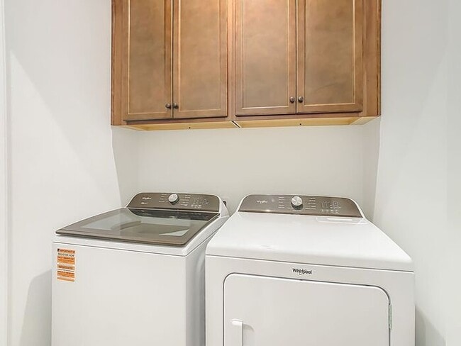 Building Photo - New Luxury Townhome in Celebration, FL Corner unit. All porcelain tiled floors. Aleutian model by...