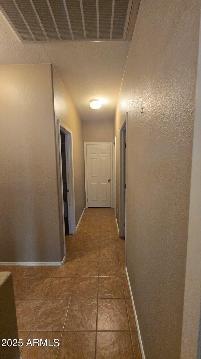 Building Photo - 4216 N 125th Ave