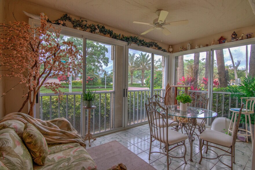glass and screen enclosed lanai - 106 Siena Way