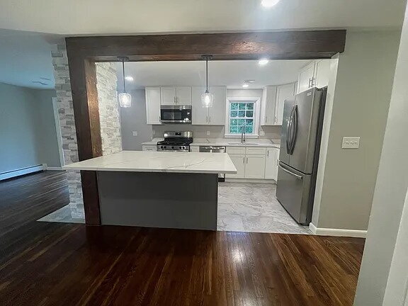 Building Photo - A great opportunity to enjoy coastal living in a peaceful setting.