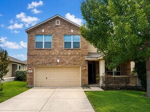 Building Photo - BEAUTIFUL 3 BEDROOM 2.5 BATH FEATURING A LUXURY KITCHEN WITH WHITE GRANITE COUNTERS, GRAY CABINET...