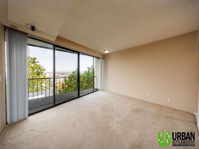 Building Photo - Spacious 2 Bedroom, 2 Bath Condo with Mode...