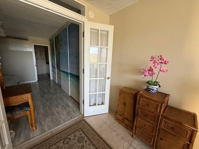 Building Photo - Mostly Furnished 2BR/2BA Condo