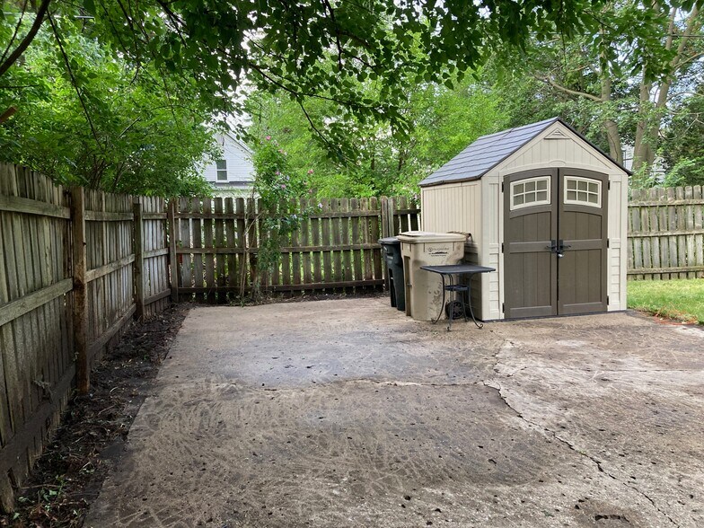 fenced back yard with parking and extra storage - 1111 Sorin St