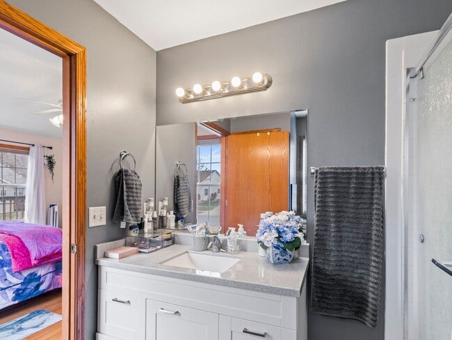 Building Photo - Spacious 3BR/3BA Condo with Finished Basement + 2-Car Garage — Available Now