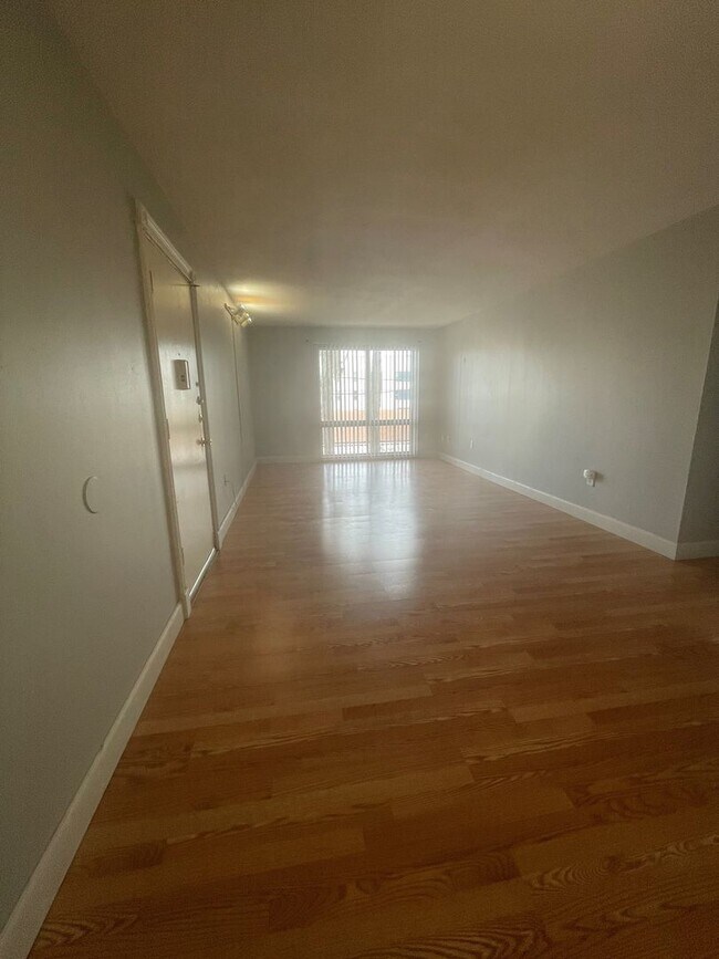 Building Photo - When Minutes Matter, Live Where You Work and Play @ Summit House Condominiums!