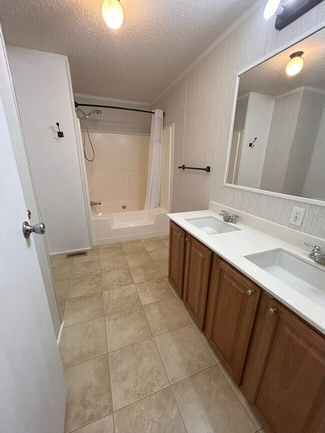 Building Photo - Immaculate 4BR Mobile Home in the heart of...