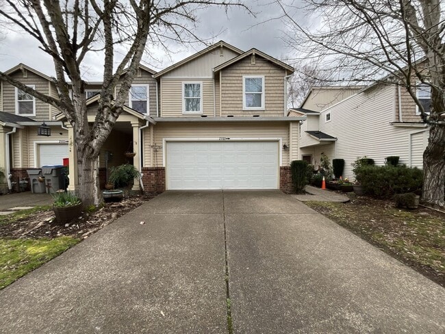 Building Photo - Inviting Two-Story 3BR Home Featuring New Carpet, New Stainless Appliances, Spacious Garage Stora...
