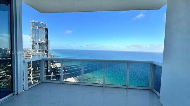 Building Photo - 18201 Collins Ave