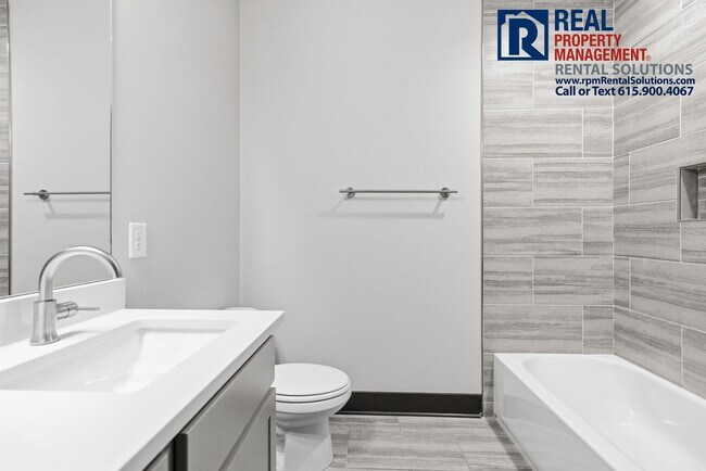 Building Photo - HALF OFF FIRST MONTHS RENT! Lovely 2BR/1.5BA end unit condo 5 mins from Downtown Nashville, washe...